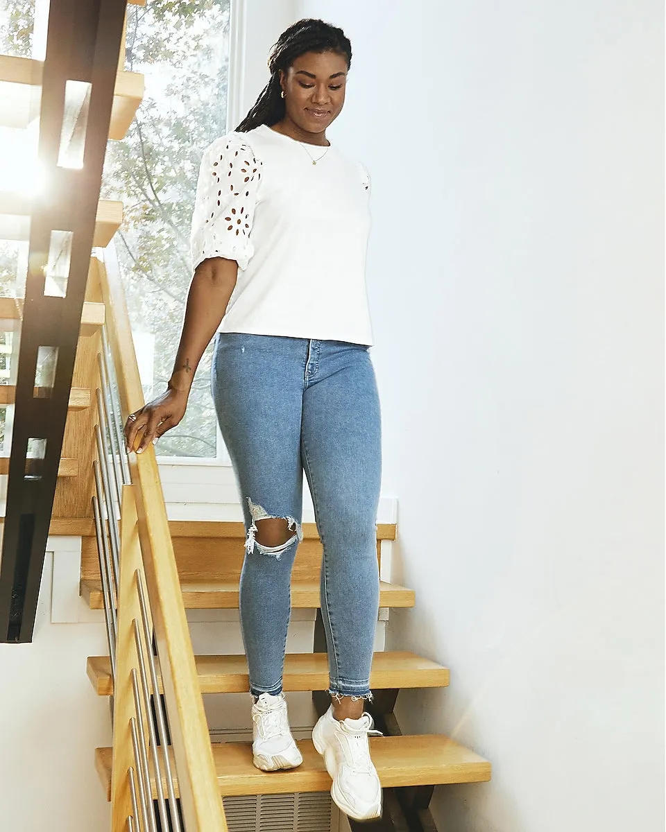 High Waisted Ripped Raw Hem Skinny Jeans in Medium Wash