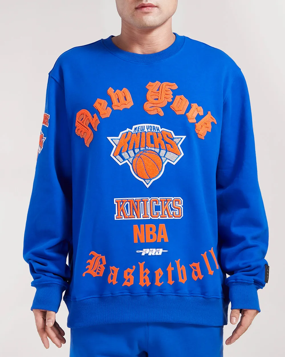 NBA NEW YORK KNICKS OLD ENGLISH MEN'S CREWNECK (ROYAL BLUE)