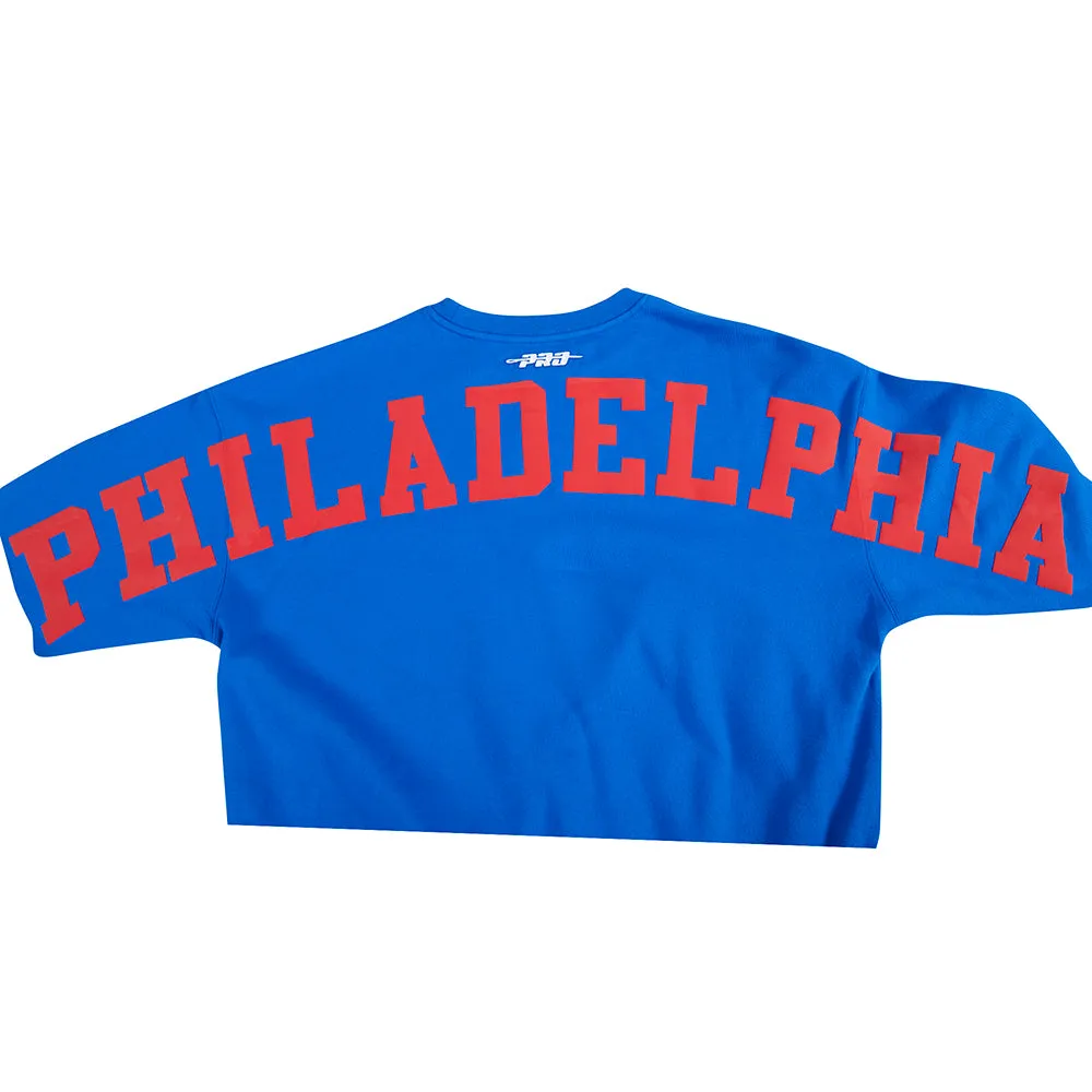 NBA PHILADELPHIA 76ERS WINGSPAN MEN'S DROP SHOULDER FLC CREWNECK (ROYAL BLUE)