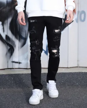 Simple & Stylish Black Ripped Jeans with Classic Plaid Patch