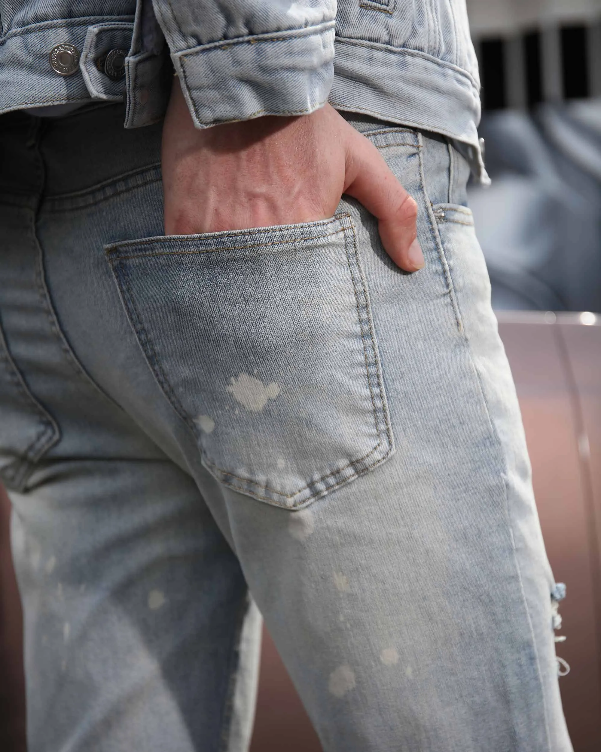 Spray Painted Light Blue Ripped Jeans with Text Embroidery