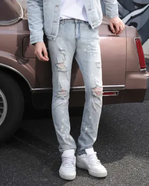 Spray Painted Light Blue Ripped Jeans with Text Embroidery