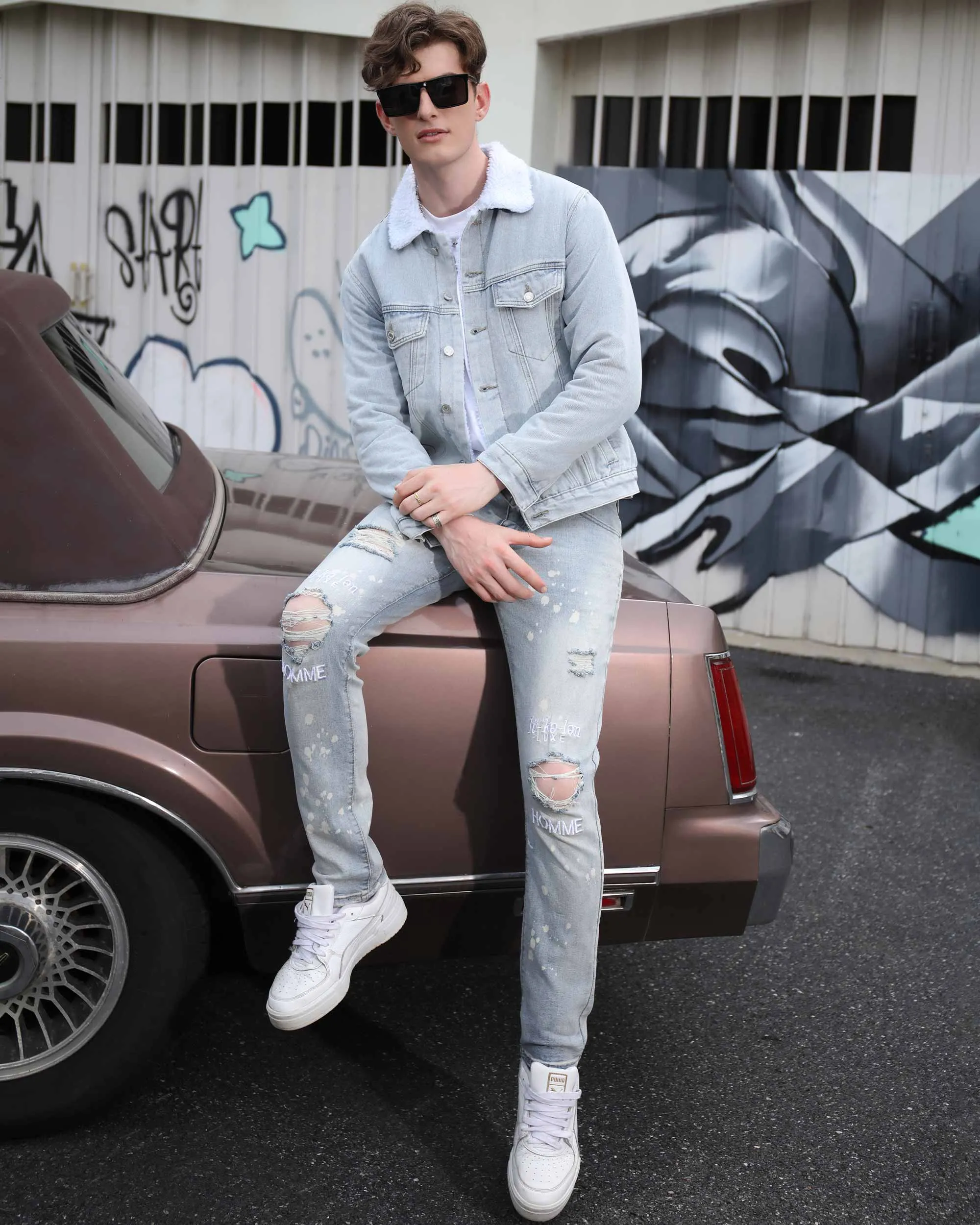 Spray Painted Light Blue Ripped Jeans with Text Embroidery