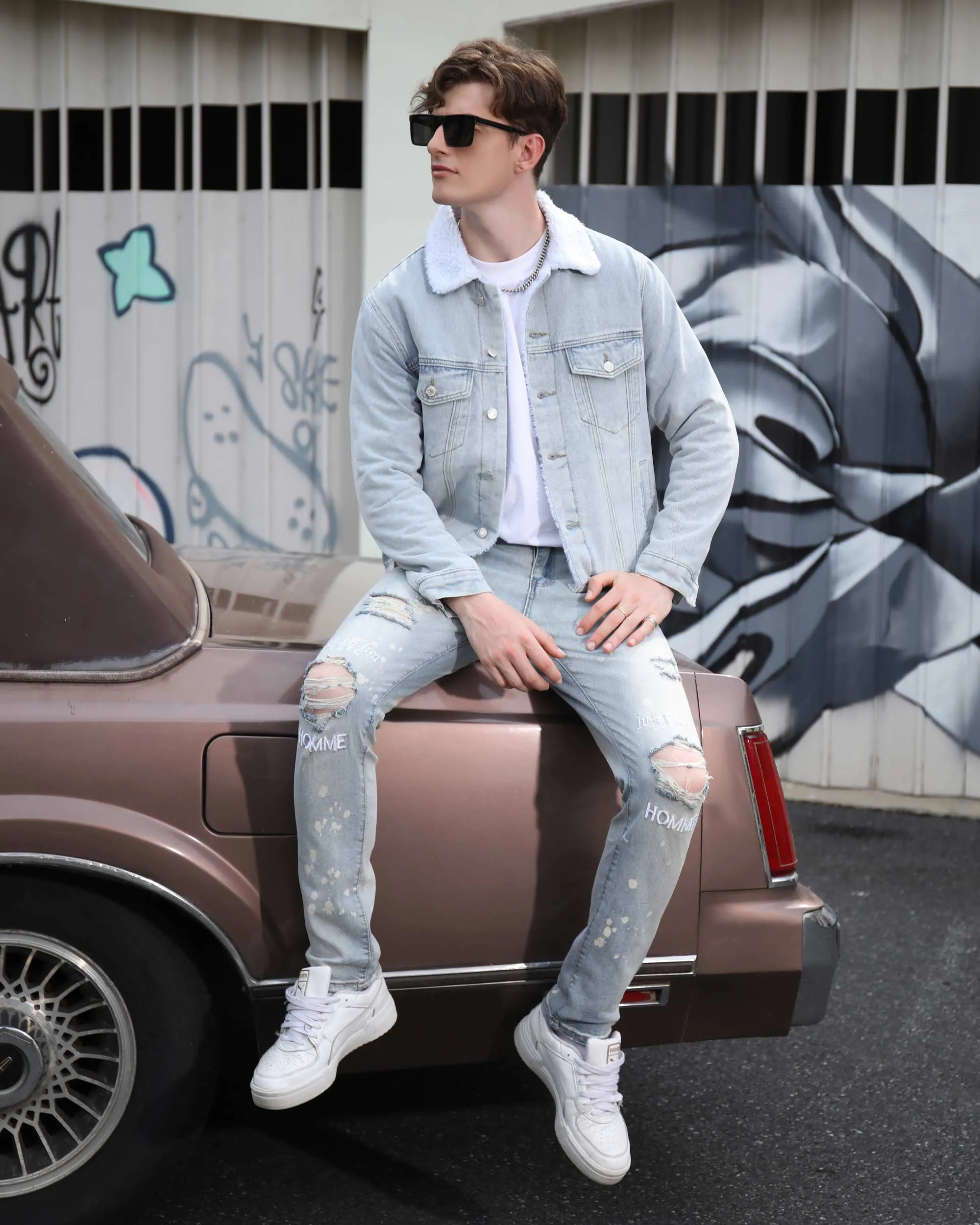 Spray Painted Light Blue Ripped Jeans with Text Embroidery