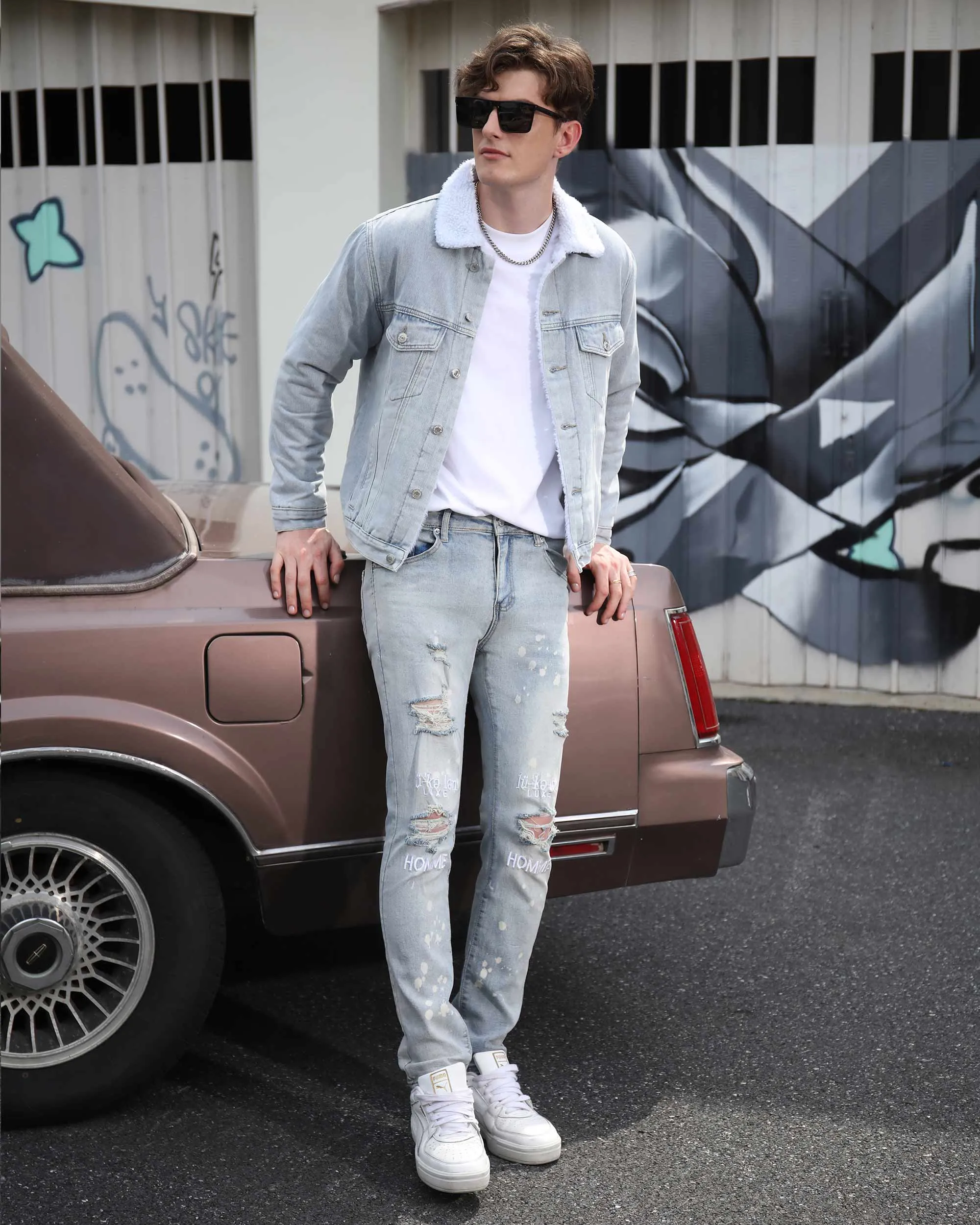 Spray Painted Light Blue Ripped Jeans with Text Embroidery